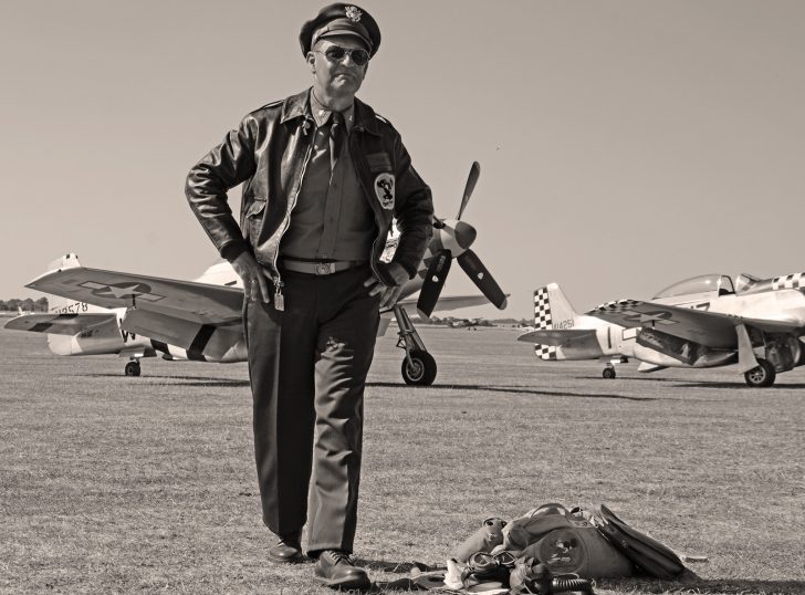 USAAF pilot in front of North American P-51D Mustangs, Flying Legends Duxford