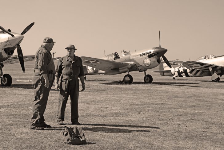 USAAF Ground crew and Curtiss P-40F Warhawk G-CGZP/41-19841/X-17 USAAF, Flying Legends Duxford