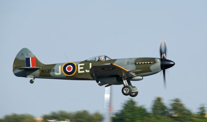 The last aircraft to land at the end of Flying Legends 2018 was Supermarine Spitfire FR XIV (G-SPIT) MV293/JE-J Tribute to Johnnie Johnson RAF, Anglia Aircraft Restorations Ltd.